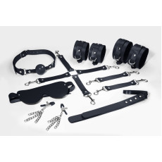 Набір Feral Feelings BDSM Kit 7 Black, наручники, поножі, конектор, маска, падл, кляп, затискачі